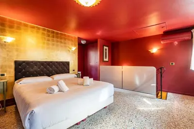 Letto o letti in una camera di Ca' di Loto