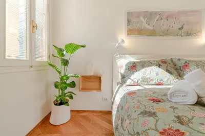 Letto o letti in una camera di Atmosfere autentiche nel cuore di Venezia