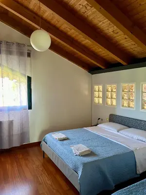 Letto o letti in una camera di BikeBnB