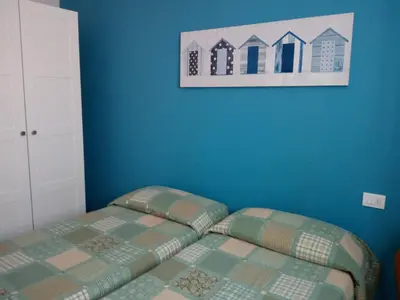 Letto o letti in una camera di Villa Olanda