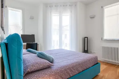 Letto o letti in una camera di Charming Home-DuomoTv