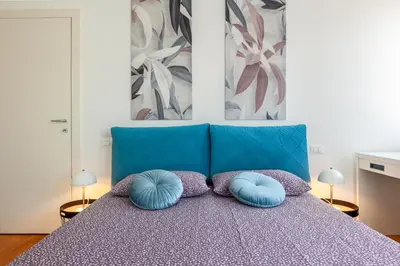 Letto o letti in una camera di Charming Home-DuomoTv