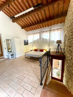 Letto o letti in una camera di Al Portico