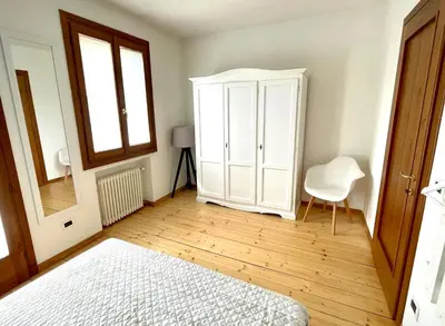 Letto o letti in una camera di Al Portico