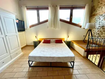 Letto o letti in una camera di Al Portico