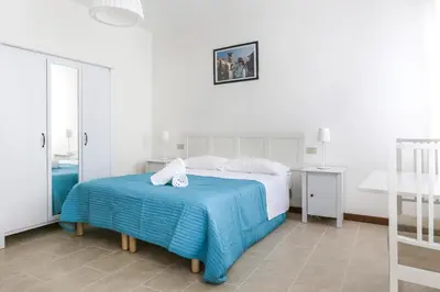 Letto o letti in una camera di Inlaguna