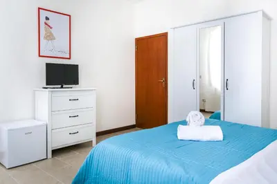 Letto o letti in una camera di Inlaguna