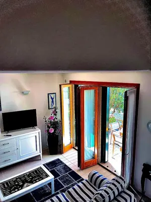 Letto o letti in una camera di Villa AdeMar Nel cuore di Jesolo