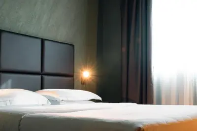 Letto o letti in una camera di Point Hotel