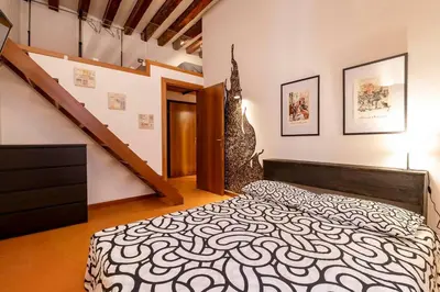 Letto o letti in una camera di Design Loft in Venice - San Polo