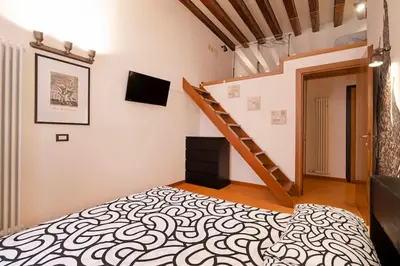 Letto o letti in una camera di Design Loft in Venice - San Polo