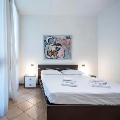 Letto o letti in una camera di Cozy Two-Room Flat in Vicenza