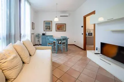 Area soggiorno di Cozy Two-Room Flat in Vicenza