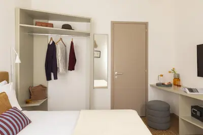 Letto o letti in una camera di Ca' La Stampa