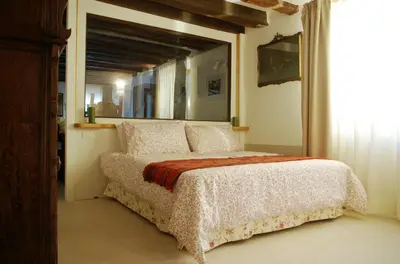 Letto o letti in una camera di Appartamento Corte Bragadin