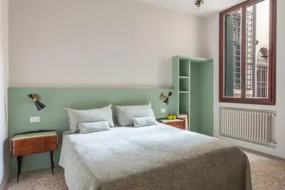 Letto o letti in una camera di Sant'Angelo Canal View