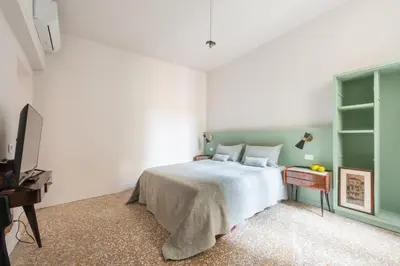 Letto o letti in una camera di Sant'Angelo Canal View