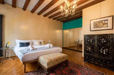 Letto o letti in una camera di Il Palazzo della Basilica