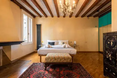 Letto o letti in una camera di Il Palazzo della Basilica