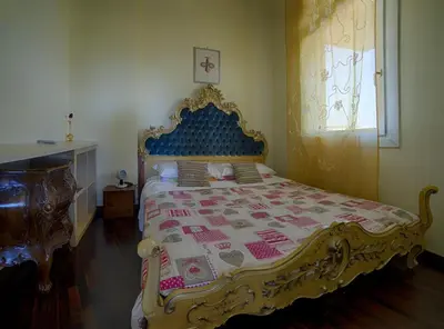 Letto o letti in una camera di Holiday Treviso Attico Vittoria