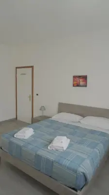 Letto o letti in una camera di At Home Mestre Via Nigra Venezia 3 bedrooms & parking free