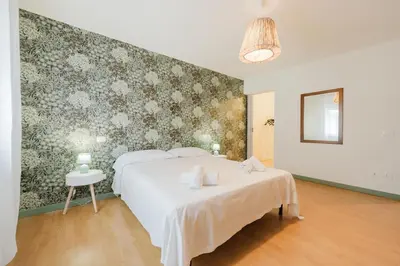 Letto o letti in una camera di Novalesi Vintage interno 2