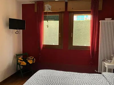 Letto o letti in una camera di Casa Padova ERicc