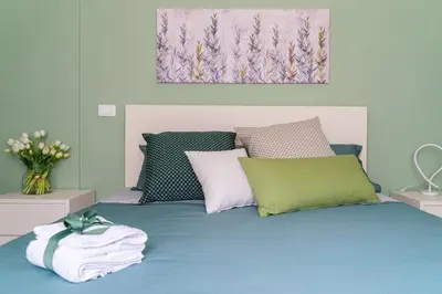 Letto o letti in una camera di Appartamento da Nonna Olly