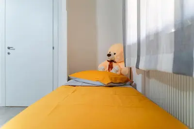 Letto o letti in una camera di Appartamento da Nonna Olly