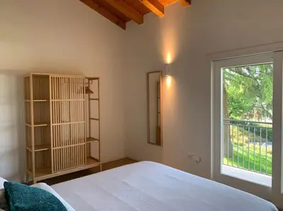 Letto o letti in una camera di Casa Cedro - Il Brolo Holiday Homes