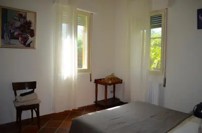 Letto o letti in una camera di Secret Garden in Lido
