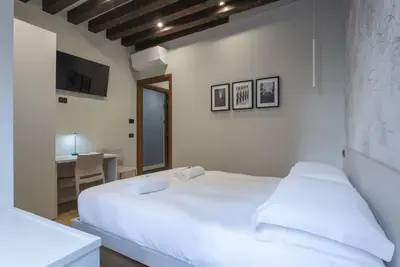 Letto o letti in una camera di Rialto Prestige Apartment