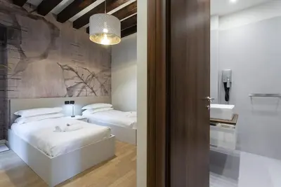 Letto o letti in una camera di Rialto Prestige Apartment