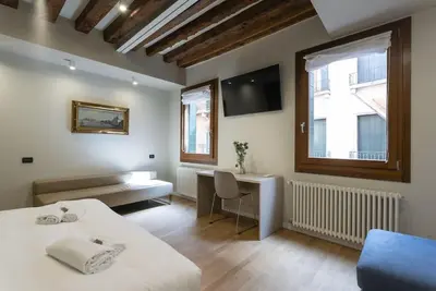 Letto o letti in una camera di Rialto Prestige Apartment