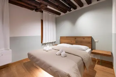 Letto o letti in una camera di Cavalletto Suite