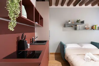 Letto o letti in una camera di Cavalletto Suite