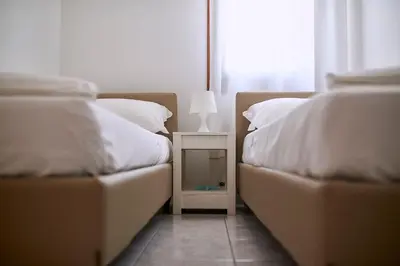 Letto o letti in una camera di Appartamento Gardenia