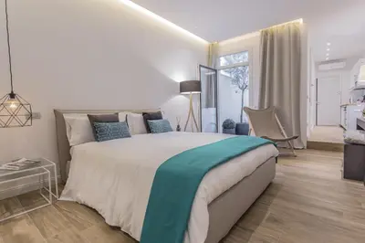Letto o letti in una camera di Erïk Langer S. Sofia C. Battisti