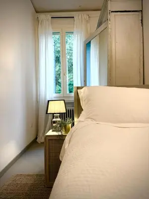 Letto o letti in una camera di Garden Lodge by Veneto Villa