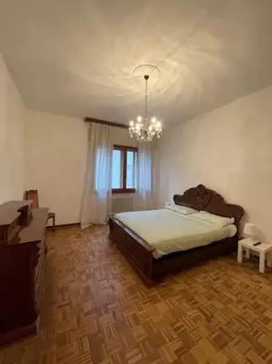 Letto o letti in una camera di Appartamento in centro storico