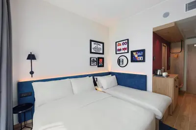 Letto o letti in una camera di Hampton By Hilton Venice Isola Nuova