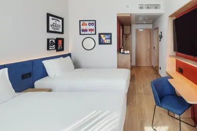 Letto o letti in una camera di Hampton By Hilton Venice Isola Nuova