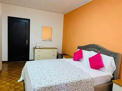 Letto o letti in una camera di First Dream Mestre