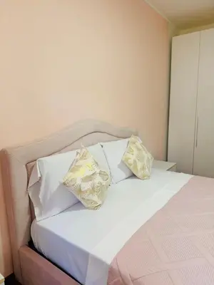 Letto o letti in una camera di First Dream Mestre