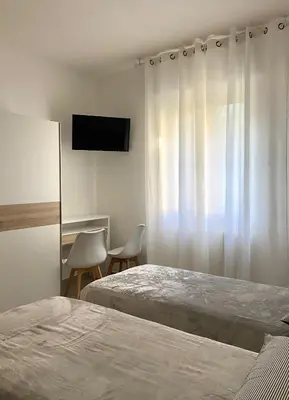 Letto o letti in una camera di A-B House