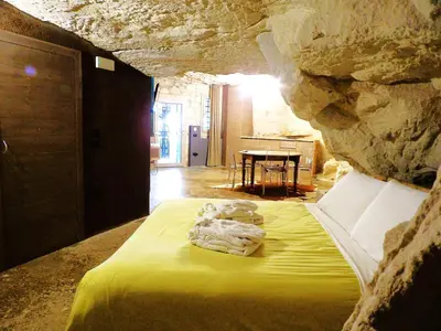 Letto o letti in una camera di Chez Les Grottes