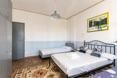 Letto o letti in una camera di GuestHost - Mestre Roomy Apartment!