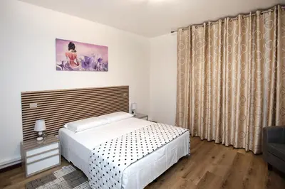 Letto o letti in una camera di Martina 2