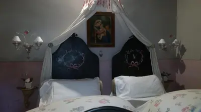Letto o letti in una camera di La Vigna B&B