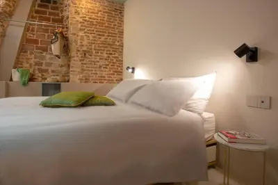 Letto o letti in una camera di IvY, canal view